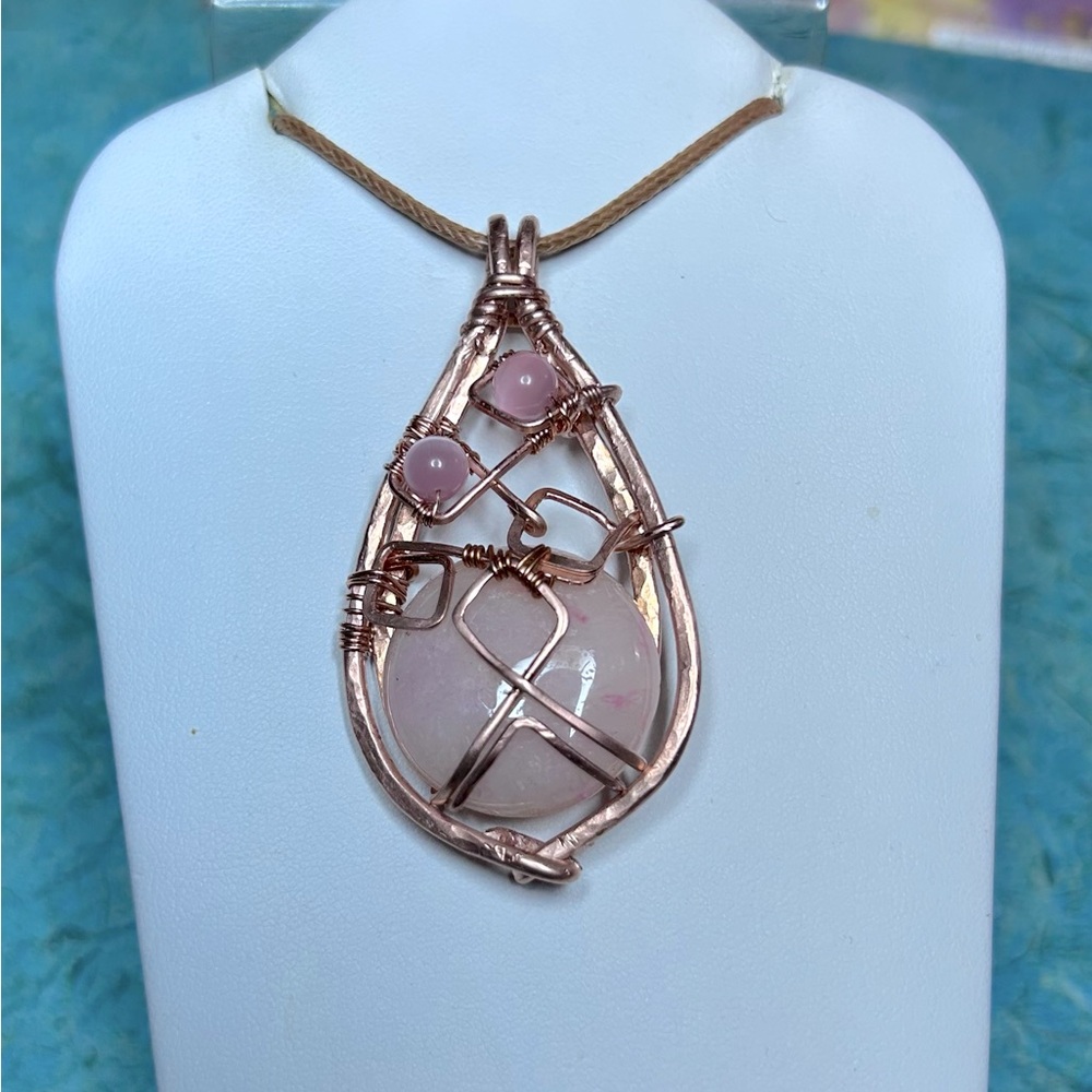 Handmade wire wrapped Raw Copper and Morganite pendant.